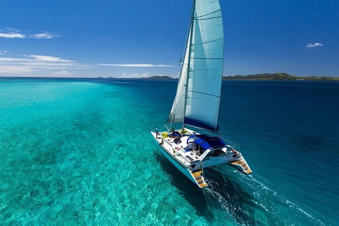Catamaran adventure to Isla Mujeres with Snorkel,Buffet,Open Bar and Beach Club - Weather, safety, and what to expect