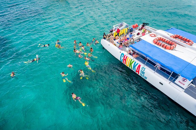 Catamaran Cruise with Snorkeling and Dunn's River Falls - Climbing Dunn’s River Falls from the beach