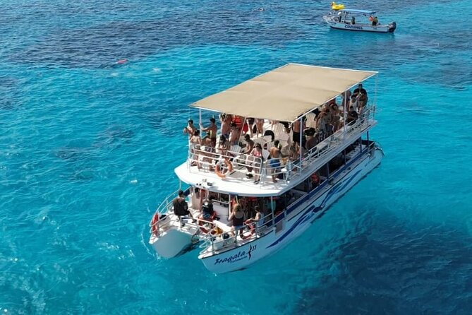 Catamaran in Cozumel with snorkeling at El Cielo and open Bar - The first reef stop, 35 minutes in the water