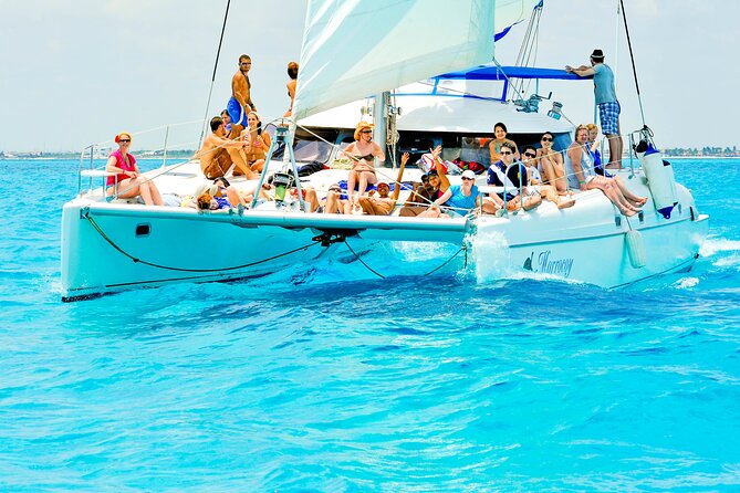 Catamaran to Isla Mujeres Snorkeling Tour with Open Bar and Lunch - Spinnaker rides and the open bar