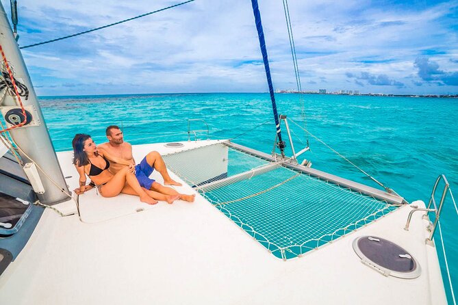 Catamaran to Isla Mujeres Snorkeling Tour with Open Bar and Lunch - The beach club stop near Isla Mujeres
