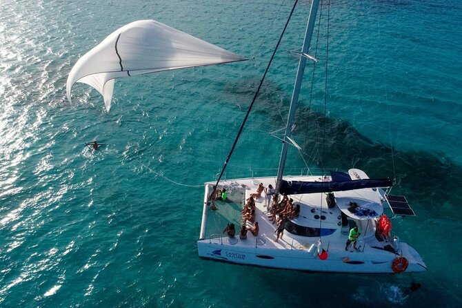 Catamaran Tour to Isla Mujeres, Open bar, Lunch, Snorkeling, Beach Club Included - Sailing out of Cancun with an open bar