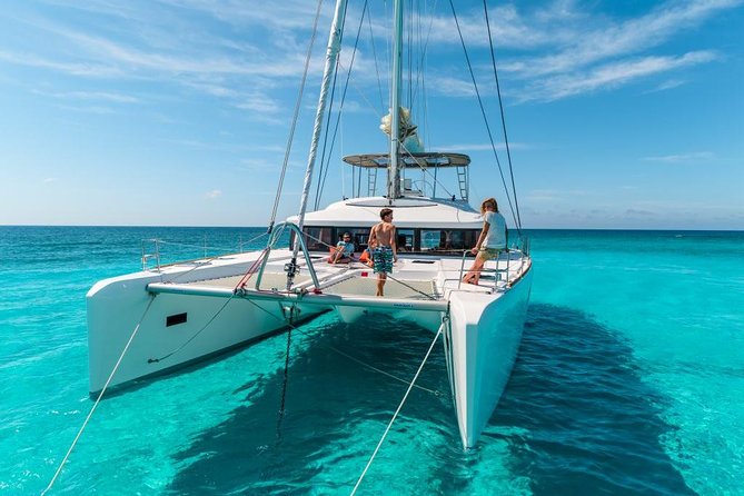 Catamaran Tour to Isla Mujeres, Open bar, Lunch, Snorkeling, Beach Club Included - El Meco Reef: a short snorkel stop
