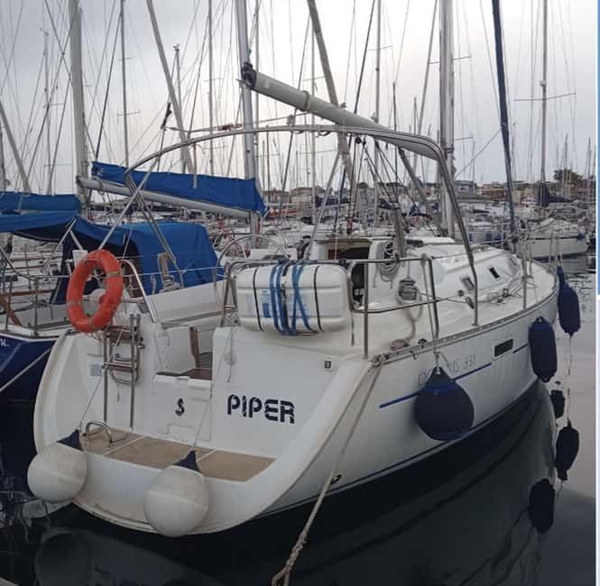 Catania: Boat Trip with Aperitif, Prosecco and Snorkeling - Ognina and the first coastal stories