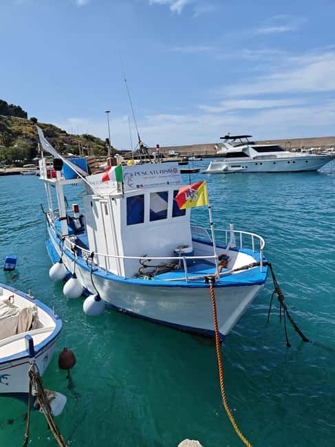 Cefalù: boat trip with fishing, coastal tour, snorkeling, and lunch on board - Watching the nets come in