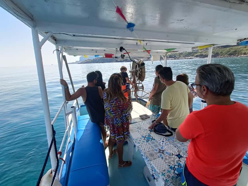 Cefalù: boat trip with fishing, coastal tour, snorkeling, and lunch on board - Swimming and snorkeling at Santa Lucia