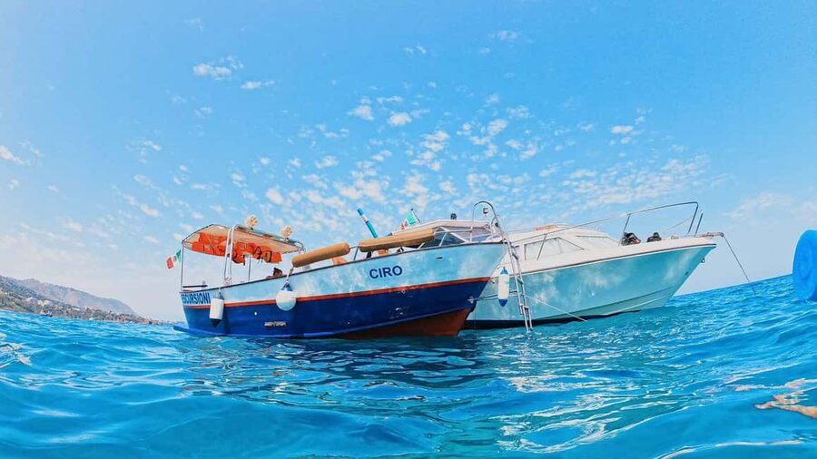 Cefalù: Coast-to-coast boat day trip with snorkeling and aperitif - Cefalù Beach: the social center of the outing