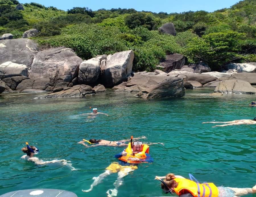 Cham Island: 1-Day Speedboat Trip with Snorkeling and Lunch - Local lunch beside the beach