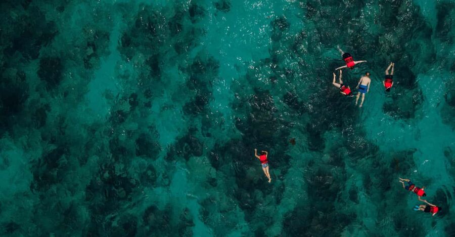 Chania: Boat Trip with Guided Snorkeling Tour - From your hotel to the Kalyves boat