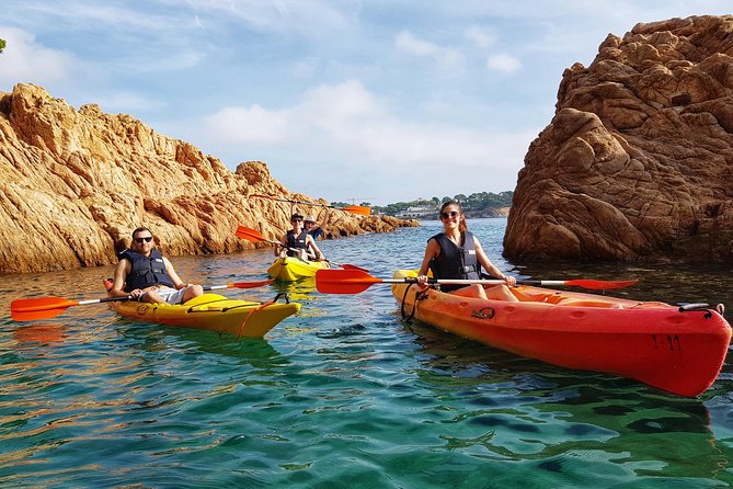 Costa Brava Tour with Kayak & Lagoon Snorkeling - Kayaking past cliffs, caves, and marine life