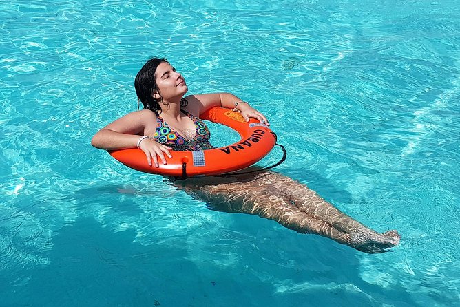 Cozumel Coral Reef Snorkeling by Glass Bottom Boat with Guide - First stop: Villa Blanca Wall