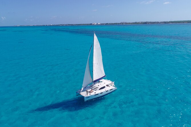 Cozumel Luxury Sailing & Snorkeling Cruise Experience - Cruising the Cozumel coast with lunch onboard