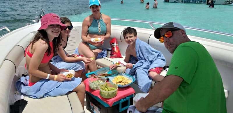 Cozumel: Private Charter Boat and Snorkel Day Trip - Guided snorkeling at a secluded reef