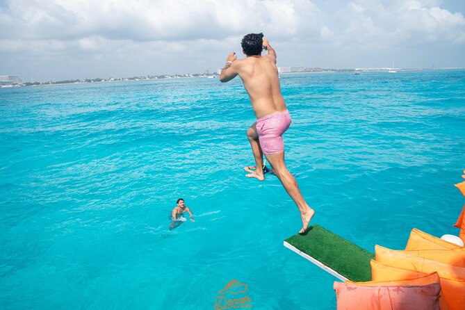 Dancer Cruise Isla Mujeres Snorkel Food and Drinks Included - Reaching Isla Mujeres