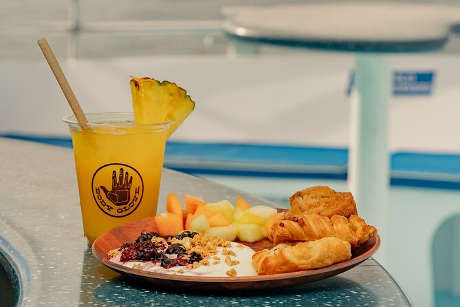Deluxe Snorkel & Dolphin Watch Aboard a Luxury Catamaran from Kailua-Kona - The $183.77 price and what you receive