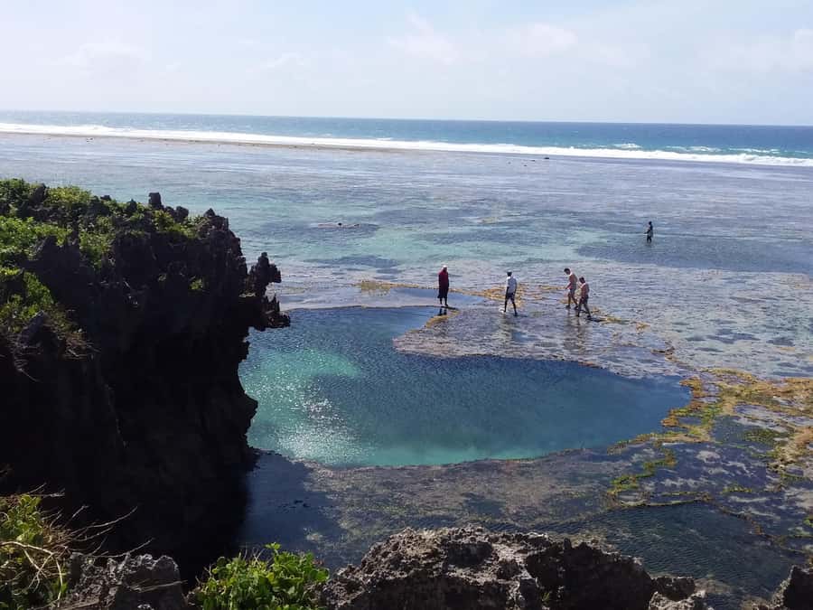 Diani: Snorkeling and Swimming at African Pool in Tiwi Beach - Cliff jumps, cave ledges, and sensible limits