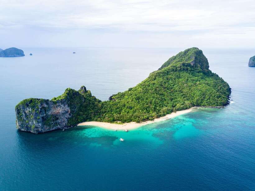 El Nido: Island Hopping and Snorkeling Private Boat Tour C - Talisay Beach offers a quieter change of pace