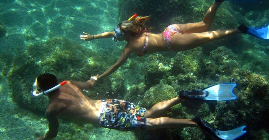 From Olbia: Dinghy Tour with Snorkeling to Tavolara Island - What the guide adds to a short boat trip