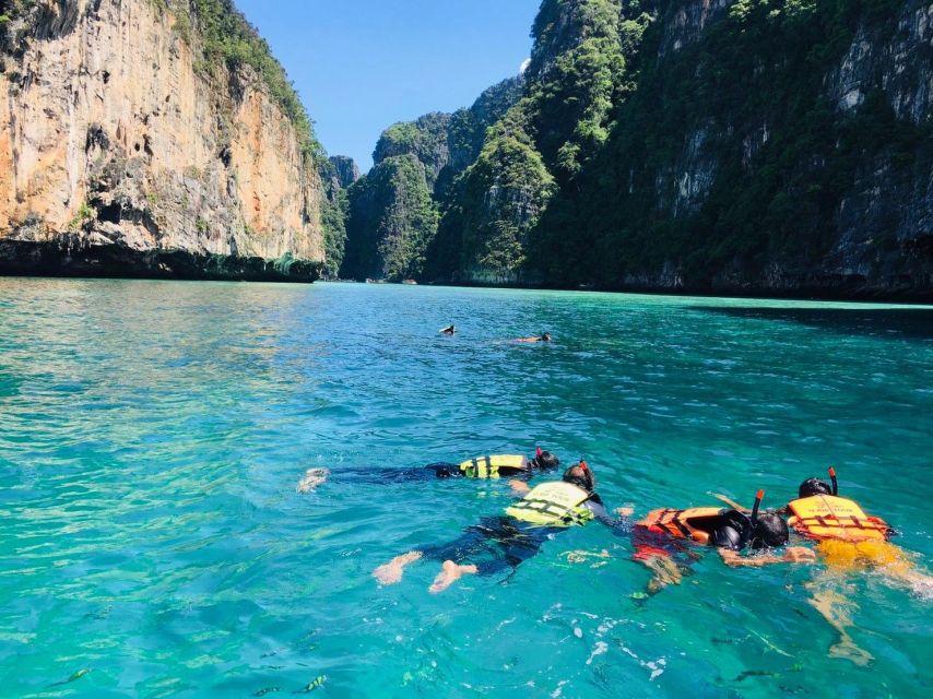 From Phi Phi: Half-Day Longtail Boat Tour with Snorkeling - Snorkeling, fish, and simple onboard comforts