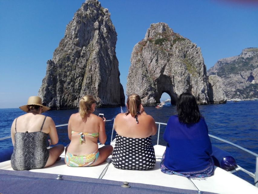 From Sorrento: Capri Boat Trip with Snorkeling and Drinks - Caves, lighthouse views, and lunch at Marina Piccola