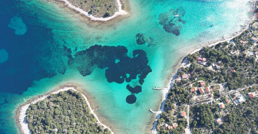 From Split: Trogir & Blue Lagoon Boat Tour with Snorkeling - Krknjaši Blue Lagoon and the limits of a picture-perfect stop