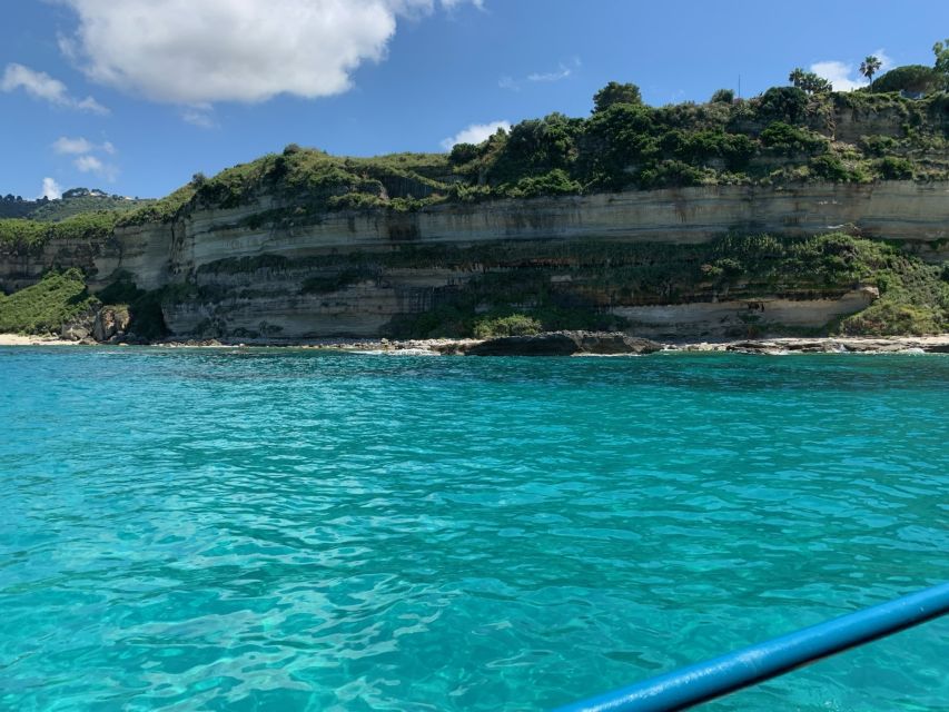 From Tropea: Capo Vaticano boat tour with snorkel & aperitif - Caves and ancient harbors along the coast