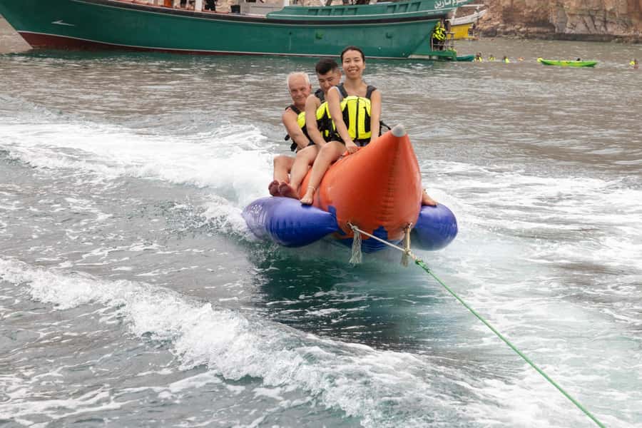 From UAE: Musandam Dibba Day Trip (Oman) - Banana boats, kayaks, and speedboat rides
