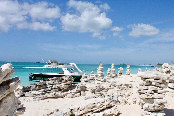 Full Day Beach BBQ Lunch & Snorkeling Excursion in Grace Bay - Boarding a catamaran built for a long day