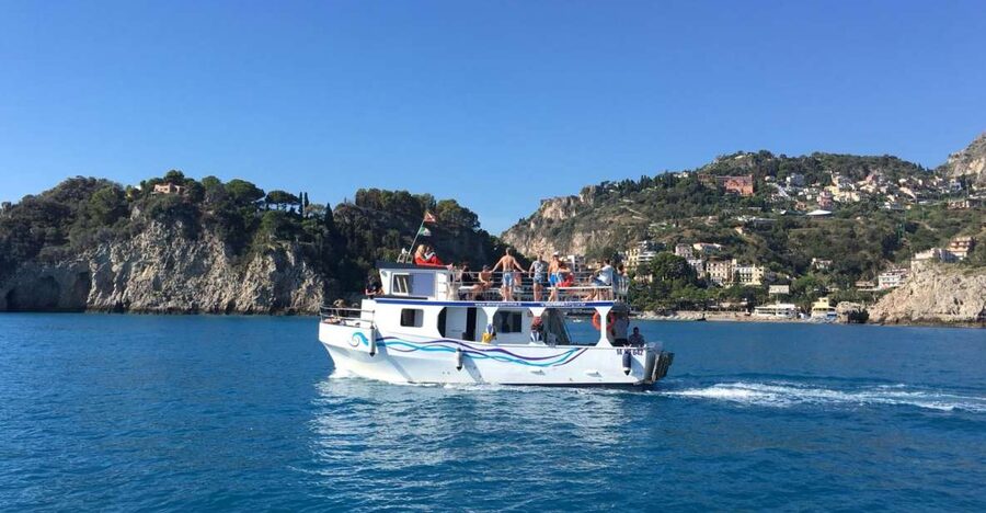 Giardini Naxos: Boat Trip Isola Bella with Snorkeling - Leaving Giardini Naxos with Etna behind you