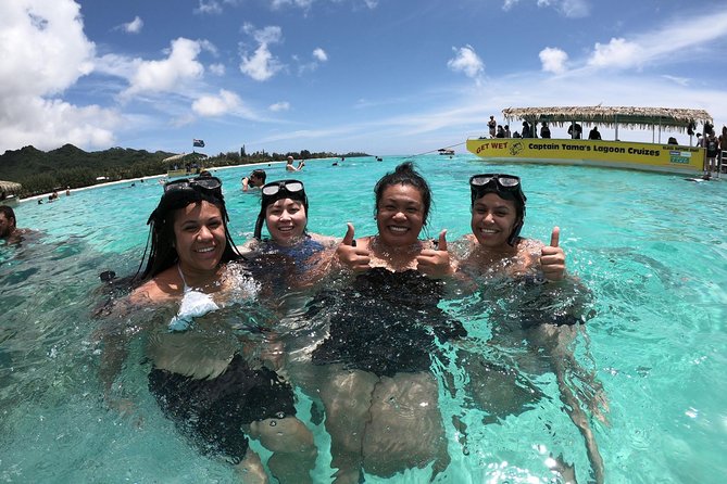 Half-Day Muri Lagoon BBQ Lunch Cruise including Snorkeling - Snorkeling with fish, clams, and Charlie