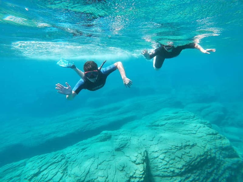 Heraklion: Boat Safari with guided snorkeling/diving tour. - Resting on board between the water stops