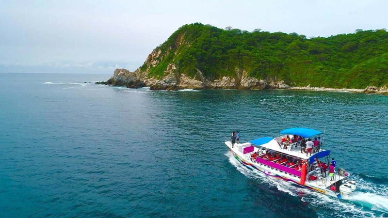 Huatulco: Premium Boat Tour with snorkel experience. - Leaving Tangolunda for Santa Cruz Pier