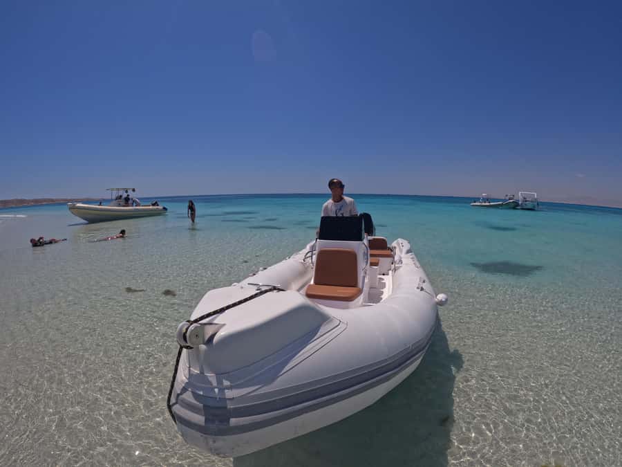 Hurghada: 4 Island Hopping Tour Dolphin, Snorkeling & Lunch - Snorkeling over coral, fish, and a shipwreck
