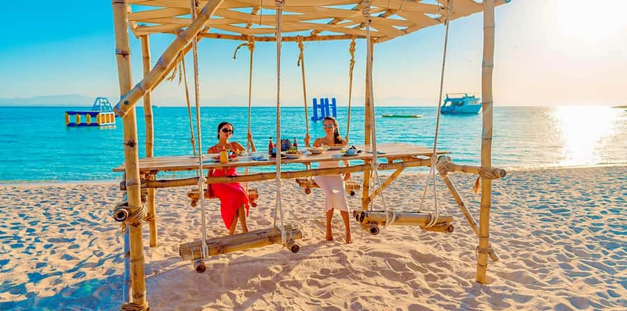 Hurghada: Hula Hula Island Boat Trip with Snorkeling & Lunch - Hula Hula Island, Red Sea beach time with a busy holiday feel