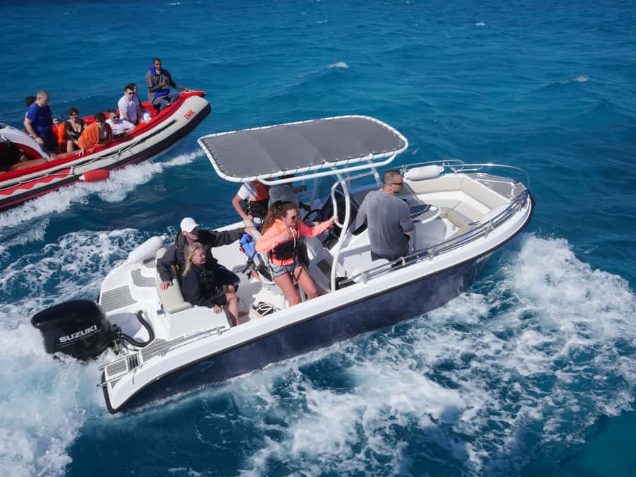 Hurghada: Orange Bay Dolphin Watching, Snorkeling & Lunch - Two snorkeling stops with time to explore