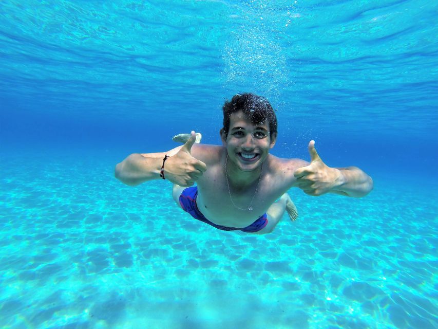 Ibiza: Sea Caves & Coves Snorkeling Paddle Boarding Tour - Finding the kiosk in San Antonio
