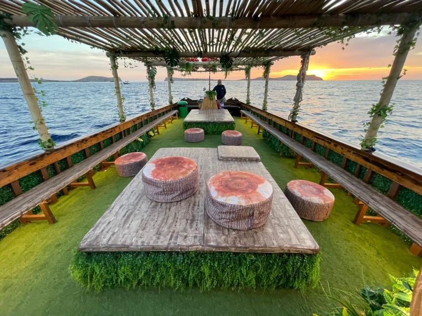 Ibiza: Sea Caves & Coves Snorkeling Paddle Boarding Tour - Drinks, fruit, music, and the Amazonia atmosphere