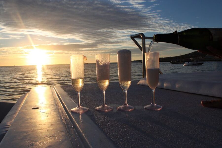 Ibiza: Snorkeling, Sunset Beach and Cave Boat Trip - The crew, music, and onboard atmosphere