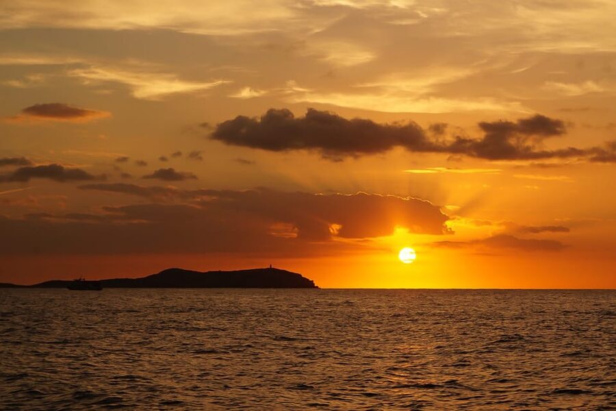 Ibiza: Sunset Boat Trip with Snorkeling, Kayaking, & Drinks - Why the western coast works so well from the water