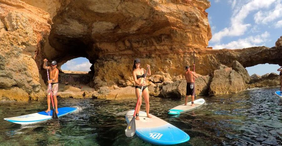 Ibiza: SUP & Snorkel Boat Tour with Caves, Drinks & Photos - Paddling toward caves and viewpoints