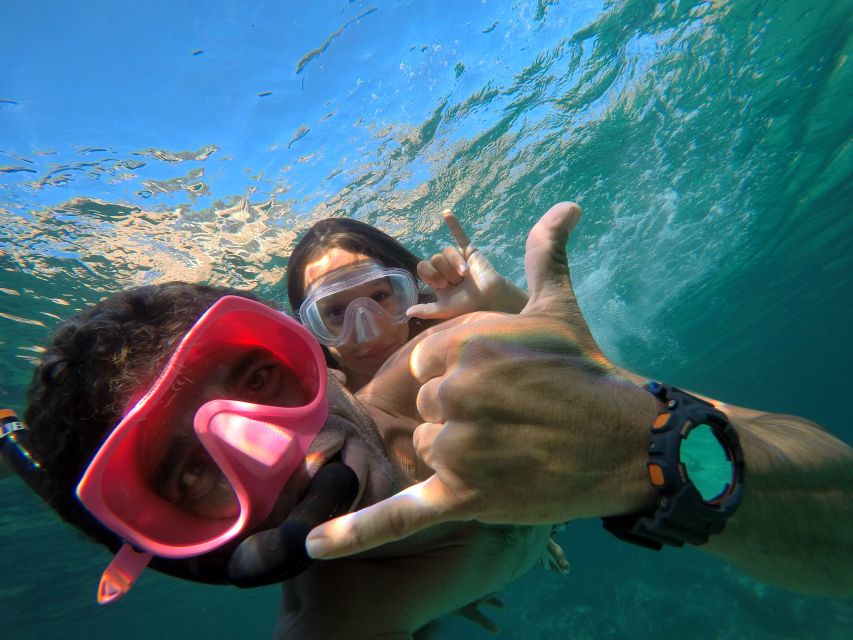 Ibiza: SUP & Snorkel Boat Tour with Caves, Drinks & Photos - A short aperitif with the coast in view