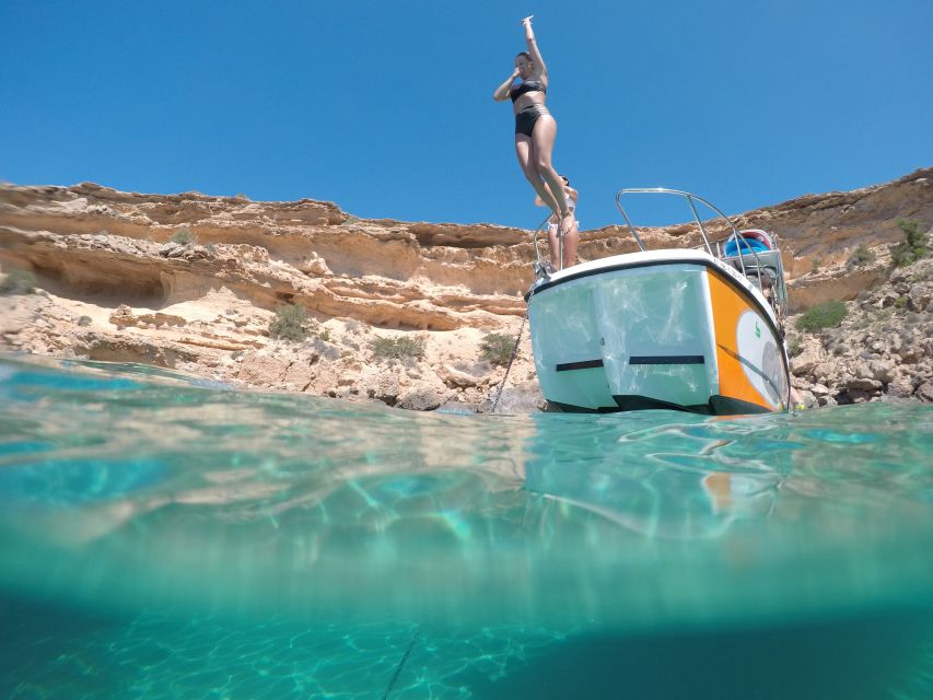 Ibiza: SUP & Snorkel Boat Tour with Caves, Drinks & Photos - Fruit, tapas, and a simple boat picnic