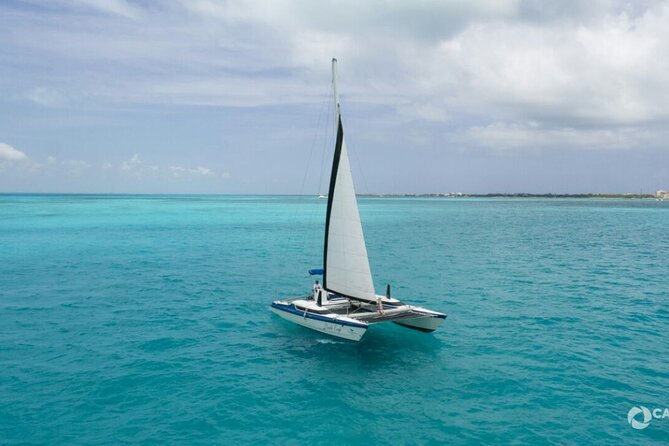 Isla Mujeres Basic Catamaran Tour with Snorkeling and Open Bar - A full Caribbean day for $53