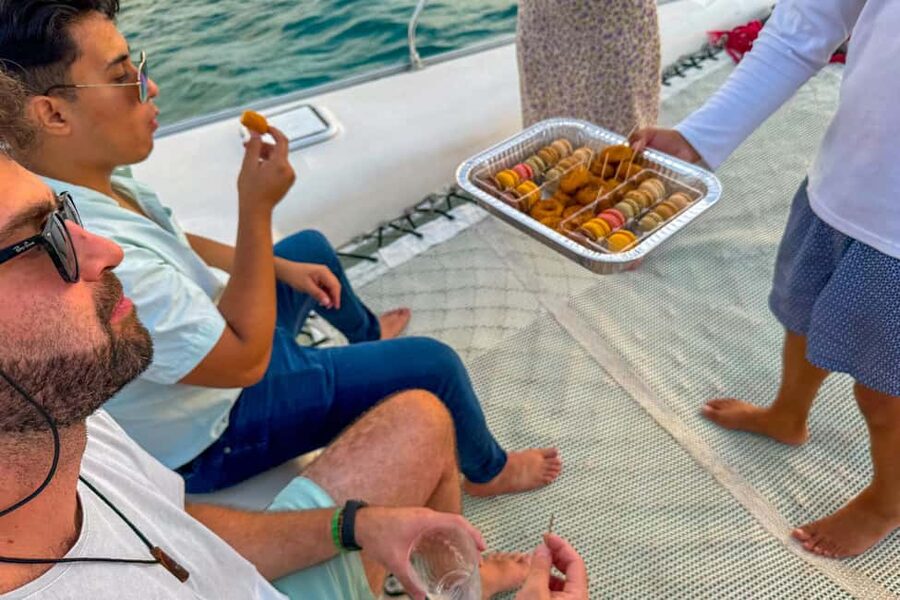 Isla Mujeres: Catamaran Ride with Open Bar, Snorkeling, and Lunch - The return boat ride to Cancun