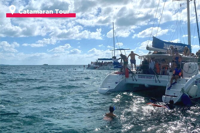 Isla Mujeres Catamaran + Snorkel + Open Bar on board + Buffet - Spinnaker rides and weather changes