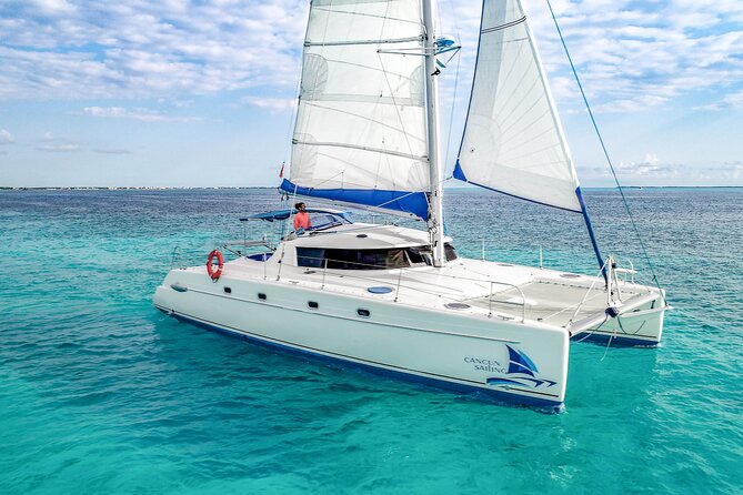 Isla Mujeres Catamaran Tour with Open Bar, Lunch and Snorkeling - Marina Sailaway check-in and hotel pickup
