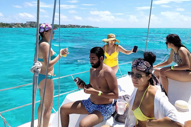 Isla Mujeres Catamaran Tour with Snorkeling at MUSA, Buffet Lunch & Open Bar - Isla Mujeres brings lunch, shopping, and a beach stop