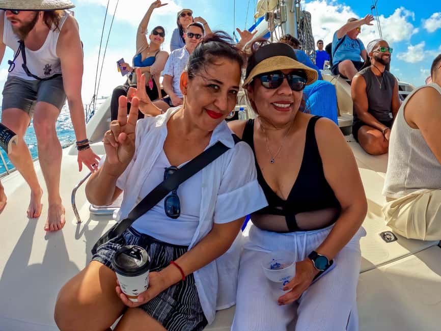 Isla Mujeres Catamaran Tour with Snorkeling & Open bar - The return ride, open bar, and spinnaker flight