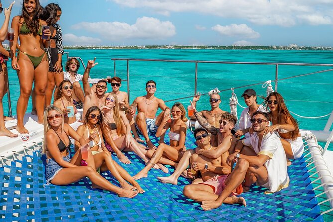 Isla Mujeres Cruise with Beach Club, Snorkel, Lunch and Open Bar - The catamaran ride and the open-bar mood