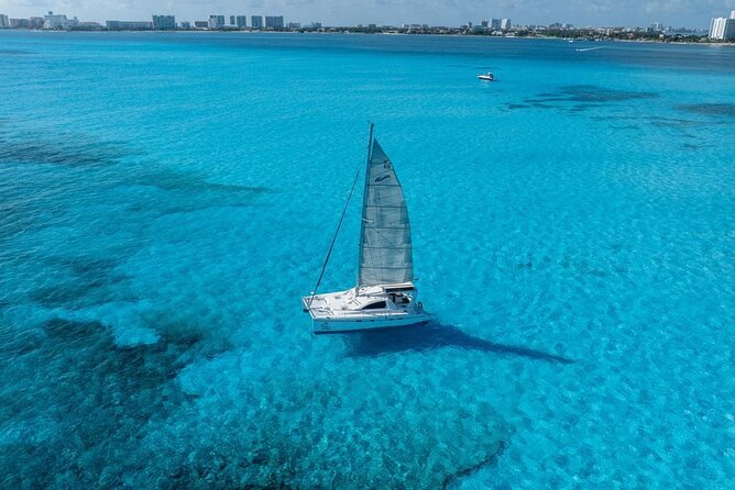 Isla Mujeres Day Tour with Catamaran, Snorkeling & Beach Club - Sailing out from Marina Las Perlas